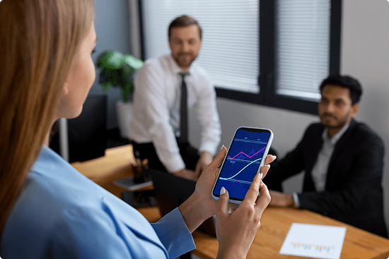 person-looking-finance-graphs 1 (1) 1